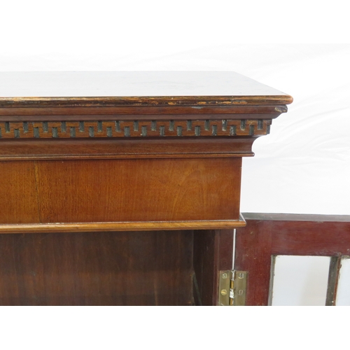 295 - Edwardian mahogany bookcase with astragal glazed doors, shelved interior, dentil frieze, on bracket ... 