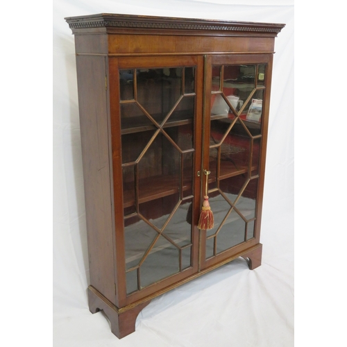 295 - Edwardian mahogany bookcase with astragal glazed doors, shelved interior, dentil frieze, on bracket ... 