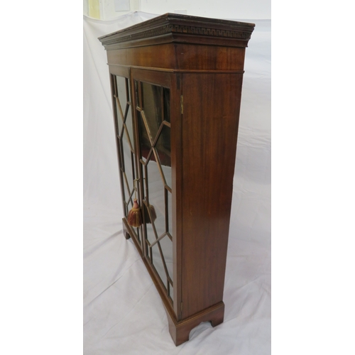 295 - Edwardian mahogany bookcase with astragal glazed doors, shelved interior, dentil frieze, on bracket ... 