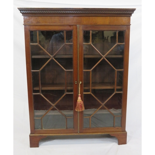 295 - Edwardian mahogany bookcase with astragal glazed doors, shelved interior, dentil frieze, on bracket ... 