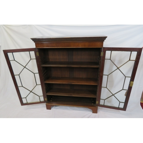 295 - Edwardian mahogany bookcase with astragal glazed doors, shelved interior, dentil frieze, on bracket ... 