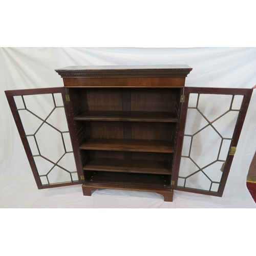 295 - Edwardian mahogany bookcase with astragal glazed doors, shelved interior, dentil frieze, on bracket ... 