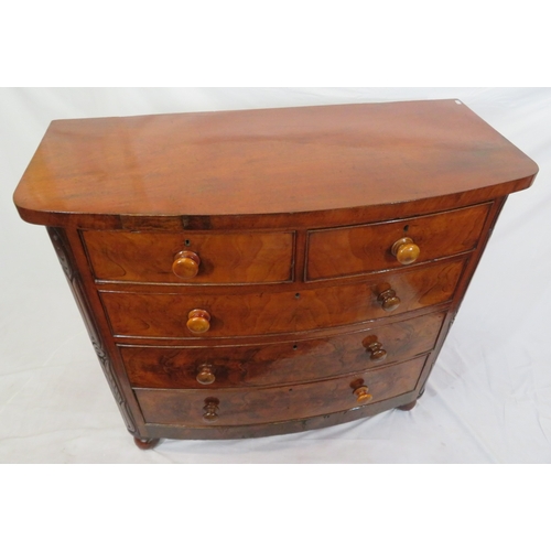 305 - Victorian mahogany & walnut bow fronted chest of 2 short & 3 long drawers with bun handles, on ball ... 