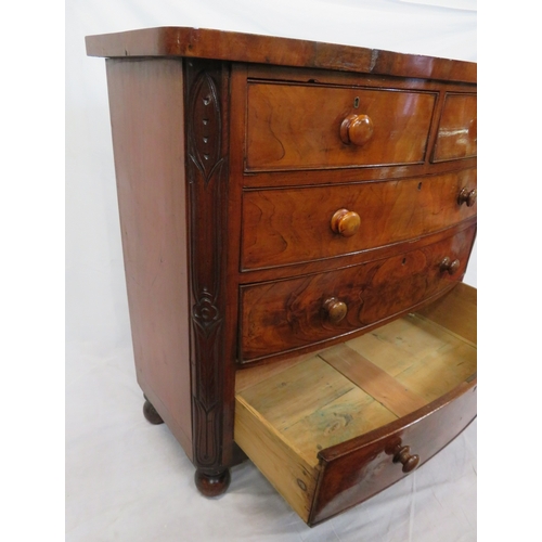 305 - Victorian mahogany & walnut bow fronted chest of 2 short & 3 long drawers with bun handles, on ball ... 