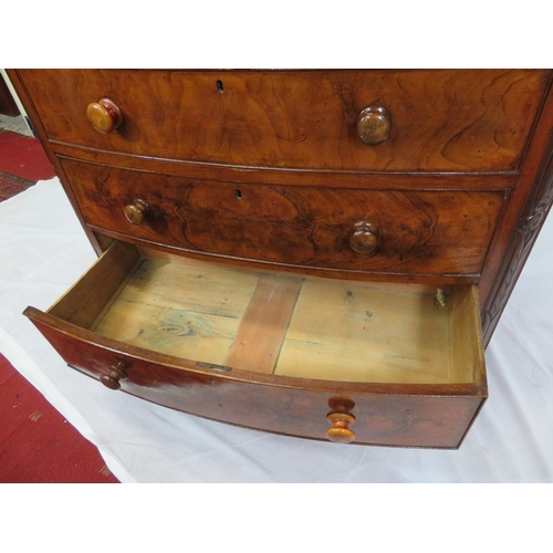 305 - Victorian mahogany & walnut bow fronted chest of 2 short & 3 long drawers with bun handles, on ball ... 