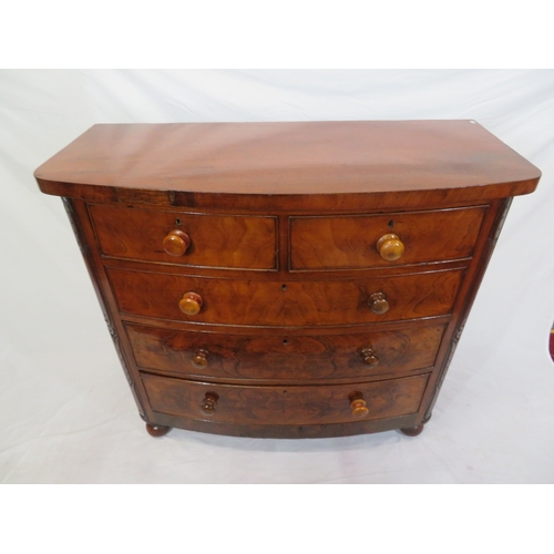 305 - Victorian mahogany & walnut bow fronted chest of 2 short & 3 long drawers with bun handles, on ball ... 