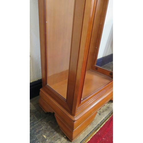 320 - Walnut cased display cabinet with glazed doors & shelving, on bracket feet