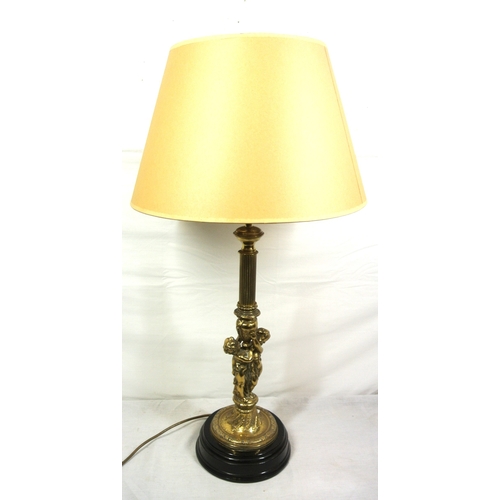 322 - Ornate brass electric table lamp with reeded & figured foliate decorated column, on round stepped ba... 