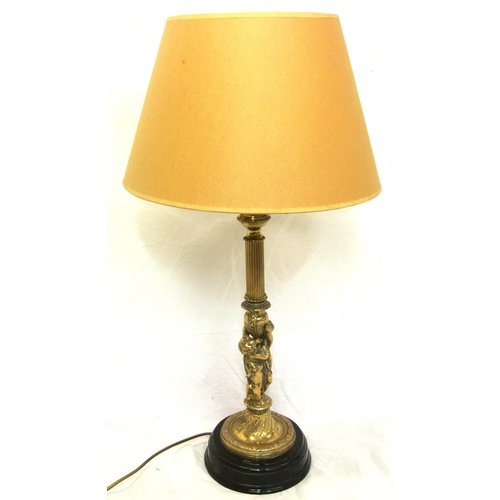 322 - Ornate brass electric table lamp with reeded & figured foliate decorated column, on round stepped ba... 