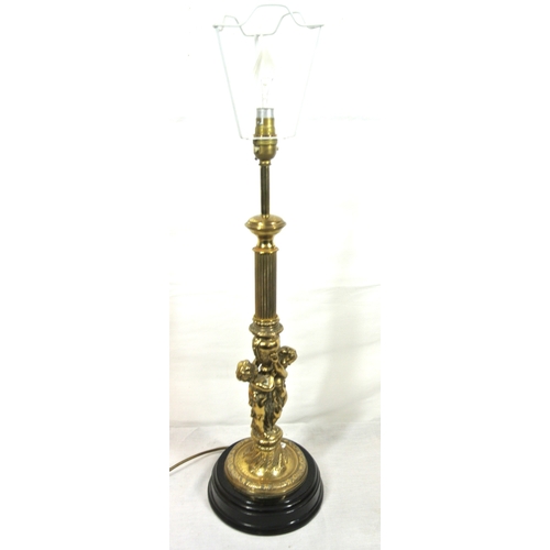 322 - Ornate brass electric table lamp with reeded & figured foliate decorated column, on round stepped ba... 