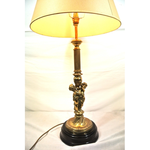 322 - Ornate brass electric table lamp with reeded & figured foliate decorated column, on round stepped ba... 