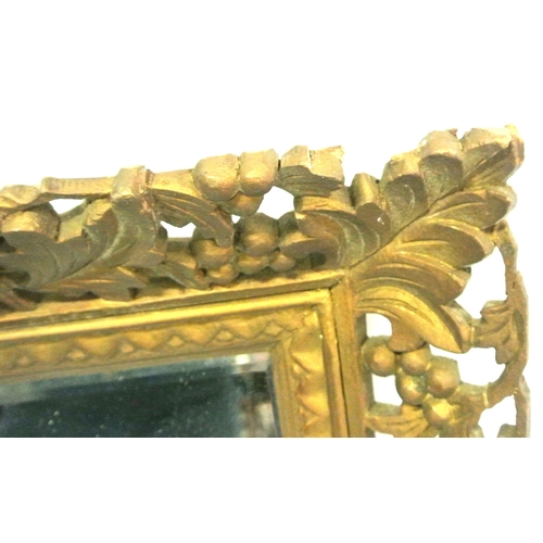 332 - Victorian style timber wall mirror with ornate foliate & grapevine carved frame