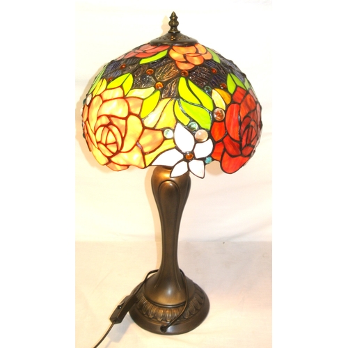 342 - Art Deco style electric table lamp with ornate multi-coloured shade, on shaped round bronzed base