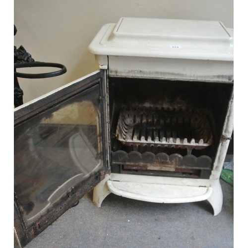 374 - Valiant cast iron French stove with door & shelf