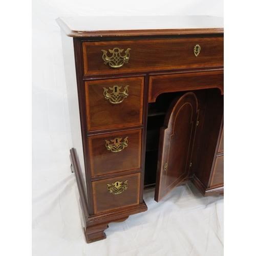 386 - Edwardian inlaid & crossbanded mahogany kneehole desk, 1 frieze & 6 side drawers with brass drop han... 