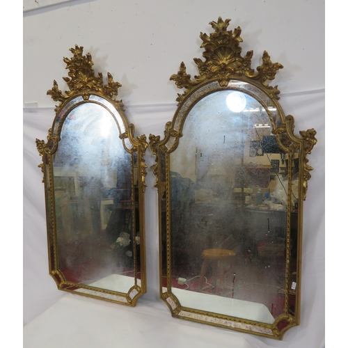 397 - Pair of ornate French style domed framed wall  mirrors with ornate shell & foliate decoration