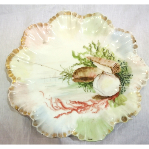 402 - 14 piece Limoges breakfast service with scalloped borders, ornately decorated with scenes & foliage