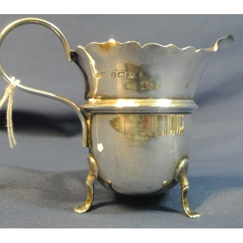 66 - 2 English silver creamers with wavy rims and shaped handles, Chester & Birmingham, total weight 123g