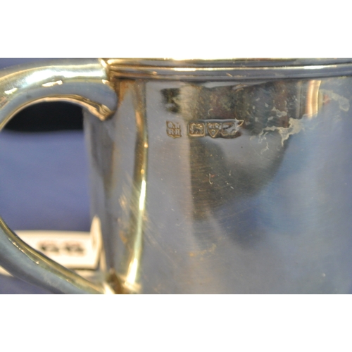 68 - Chester silver mug with shaped handle and reeded rim, h6.5cm, 98g