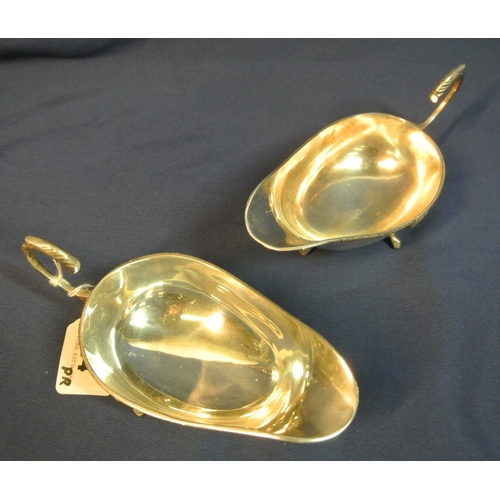 84 - Pair of boat shaped silver plated sauceboats with Celtic design rims, S-scroll handles and hoof feet