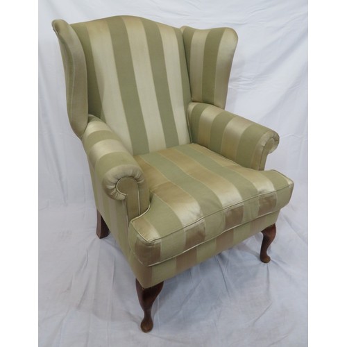 477 - Edwardian style wingback armchair with striped upholstery, on cabriole legs with pad feet