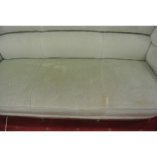 471 - Walnut framed 3 seater couch with buttoned upholstery, shaped arms, on ball feet