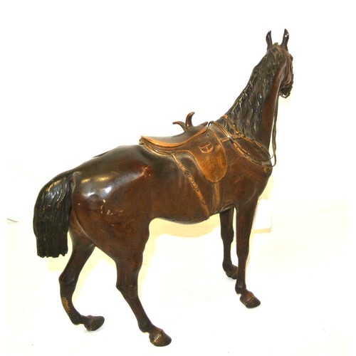 433 - German bronzed figure of a racehorse with saddle & reins