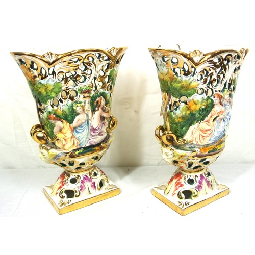 414 - Pair of Capodimonte hand-painted flower vases with figured foliate & pierced decoration, on shaped b... 