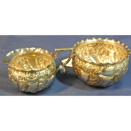 29 - London silver sugar bowl and creamer with scroll decorated panels and wavy rims