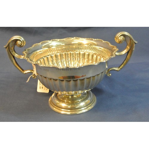 49 - Sheffield silver rose bowl with shaped handles, wavy beaded rim, reeded sides, on round stepped base... 