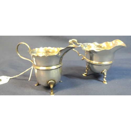 66 - 2 English silver creamers with wavy rims and shaped handles, Chester & Birmingham, total weight 123g