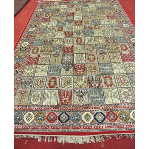 324 - Rich red ground Kashmir carpet, full pile with Persian panel design. 310 x 190cm