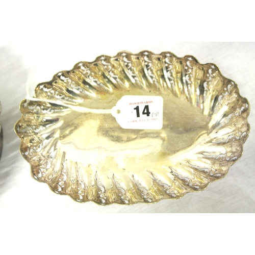 14 - Pair of oval silver plated bread or sweet dishes with pierced reeded sides, wavy rims, on oval sprea... 