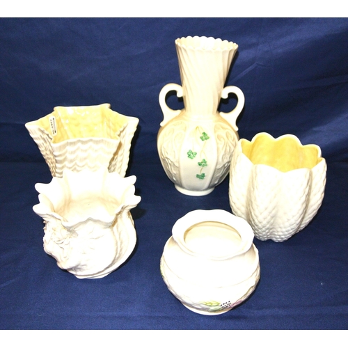 307 - 5 assorted Belleek vases with foliate decoration, in box