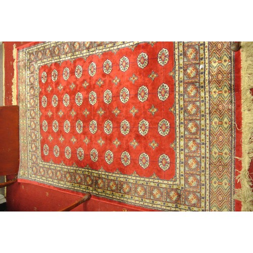 381 - Persian red ground hearth rug with medallion design 170 x118 cm