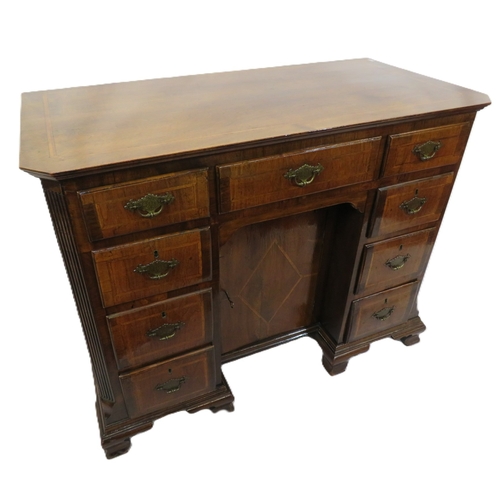 395 - Georgian mahogany kneehole desk with 9 drawers with brass drop handles & back plates, central press,... 