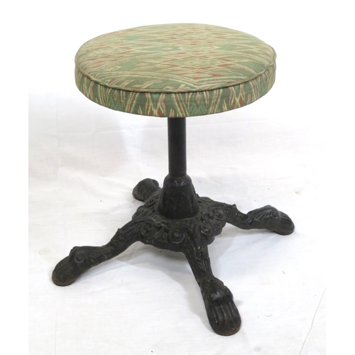 443 - Victorian style cast iron stool with round upholstered top, foliate decorated base