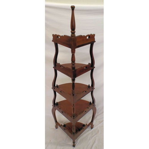 446 - Victorian mahogany bow fronted four tier whatnot with turned finials, foliate carving, on cabriole l... 