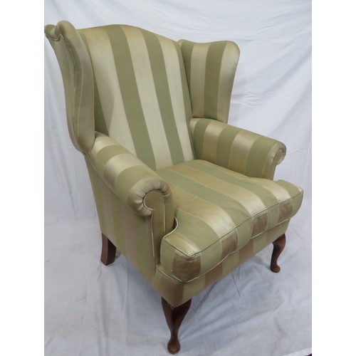 477 - Edwardian style wingback armchair with striped upholstery, on cabriole legs with pad feet