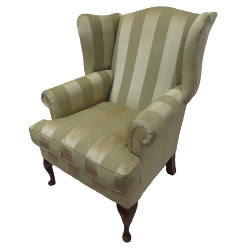 477 - Edwardian style wingback armchair with striped upholstery, on cabriole legs with pad feet