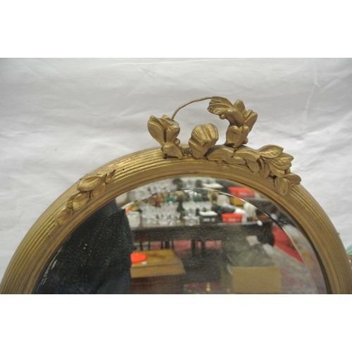 386 - Oval gilt framed bevelled glass mirror