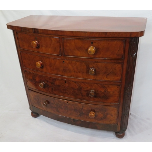 377 - Victorian mahogany & walnut bow fronted chest of 2 short & 3 long drawers with bun handles, on ball ... 