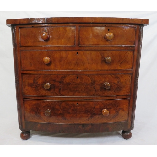 377 - Victorian mahogany & walnut bow fronted chest of 2 short & 3 long drawers with bun handles, on ball ... 