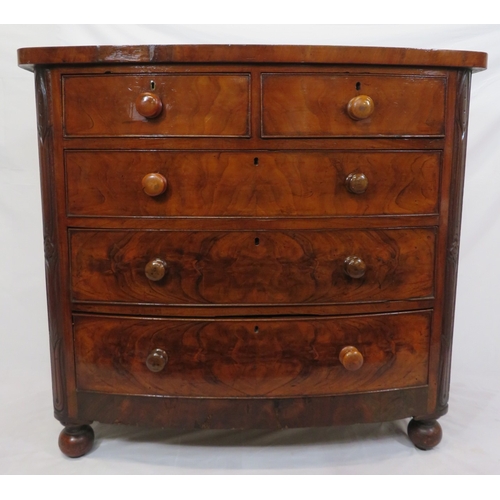 377 - Victorian mahogany & walnut bow fronted chest of 2 short & 3 long drawers with bun handles, on ball ... 