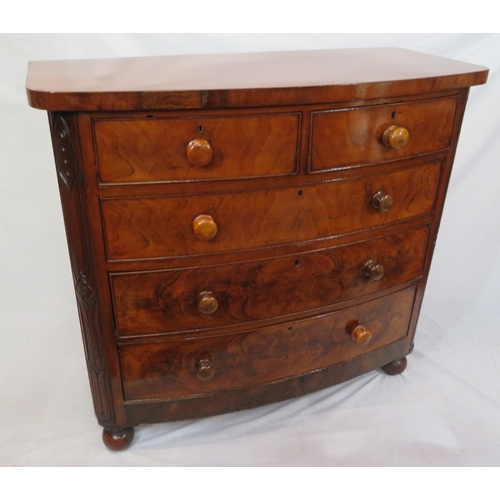 377 - Victorian mahogany & walnut bow fronted chest of 2 short & 3 long drawers with bun handles, on ball ... 