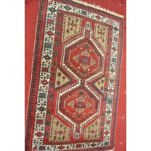 249 - Multi coloured ground hand woven Persian Heriz rug with geometrical design