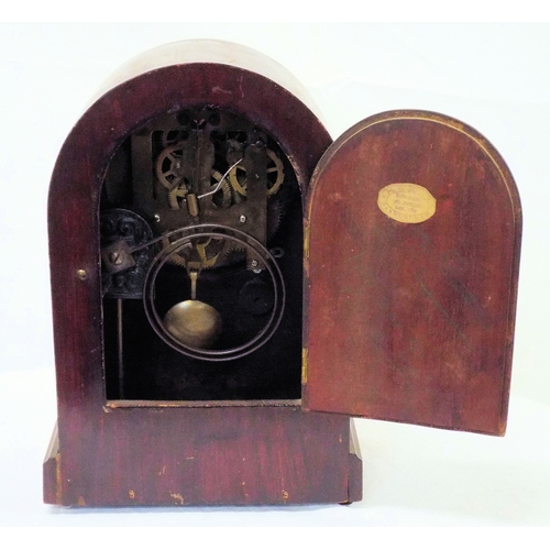 253 - Sheraton style inlaid mahogany domed mantel clock with brass framed dial, shell inlay, on bun feet