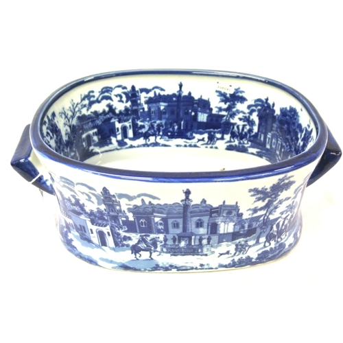 193 - Oval ironstone blue and white footbath with figured scenic decoration & shaped handles