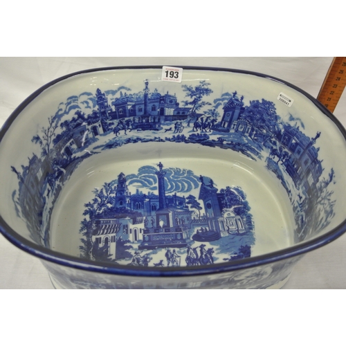 193 - Oval ironstone blue and white footbath with figured scenic decoration & shaped handles