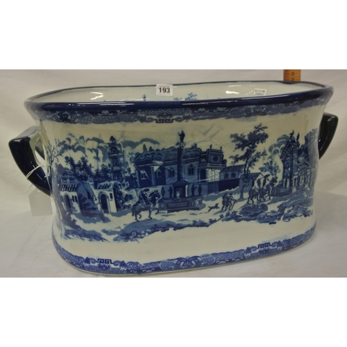 193 - Oval ironstone blue and white footbath with figured scenic decoration & shaped handles